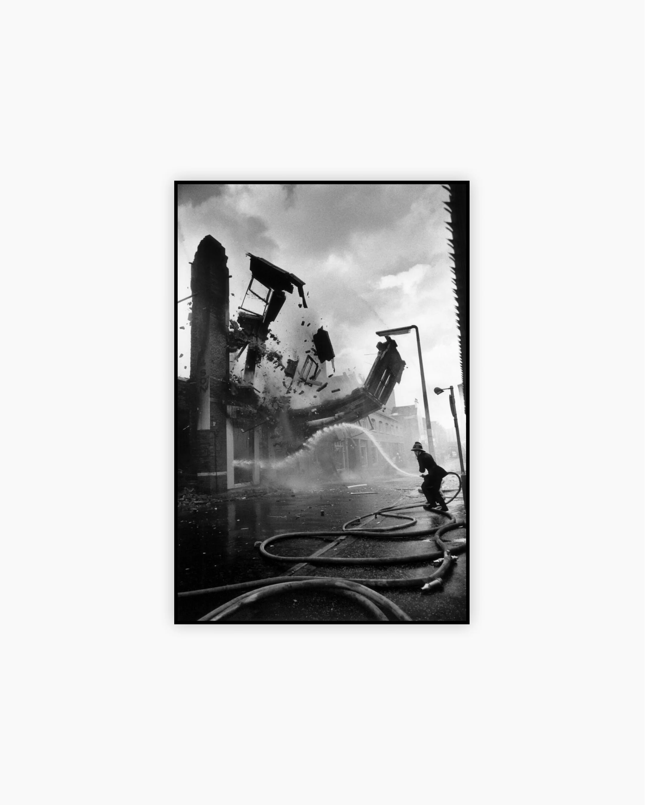 Fine Print: A burning building crumbles. Belfast, Northern Ireland, 1972