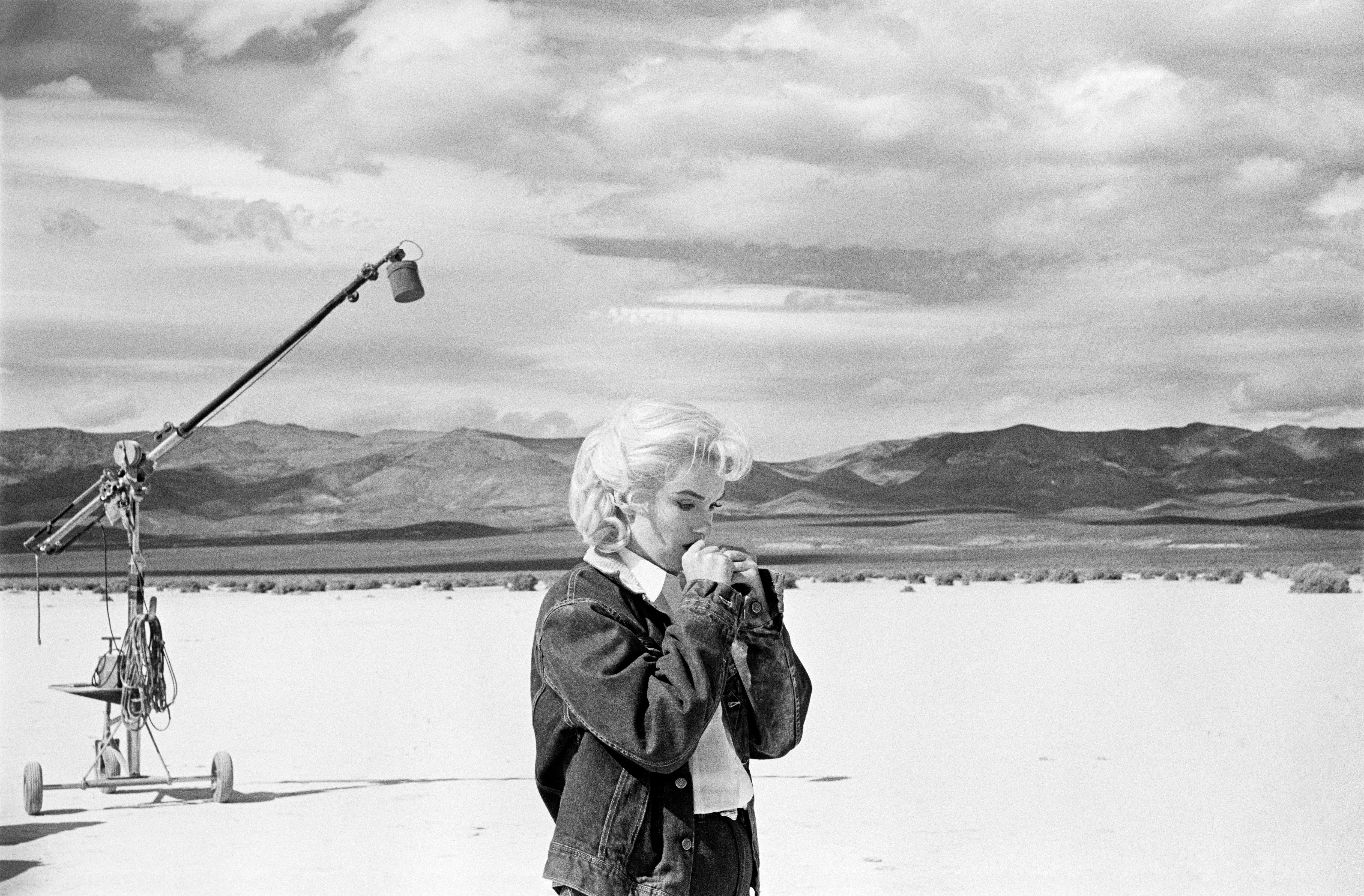 Fine Print: Marilyn Monroe on the Nevada desert going over her lines in the film 'the Misfits'. Nevada, USA, 1960 - Image 2